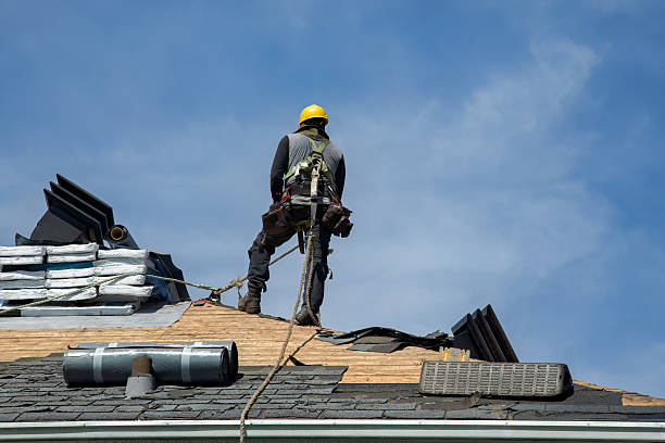 Professional Roofing technician working in Wellston, OK